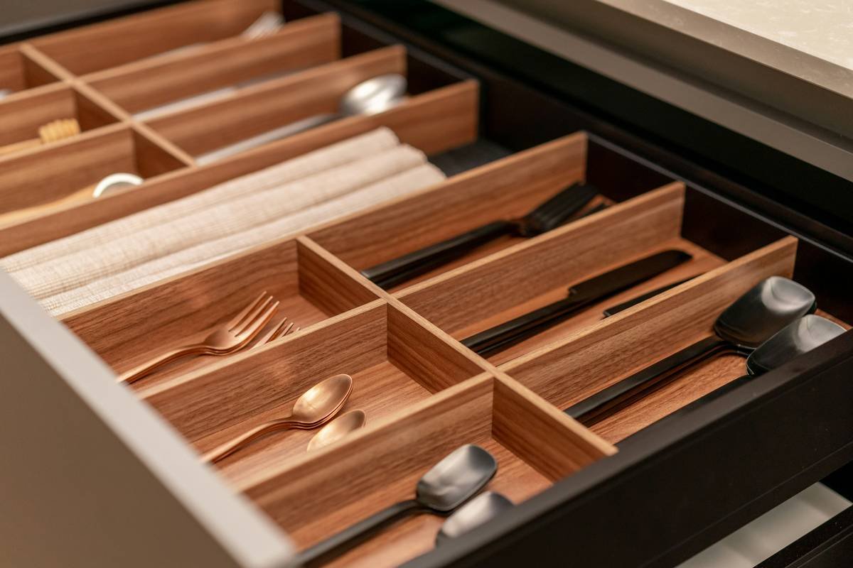 Before and after of a beauty organizer drawer transformed with modular acrylic trays for skincare and makeup tools
