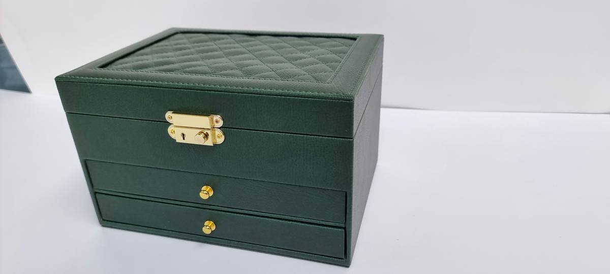 Before and after of chaotic makeup drawer transformed with custom cosmetic storage system